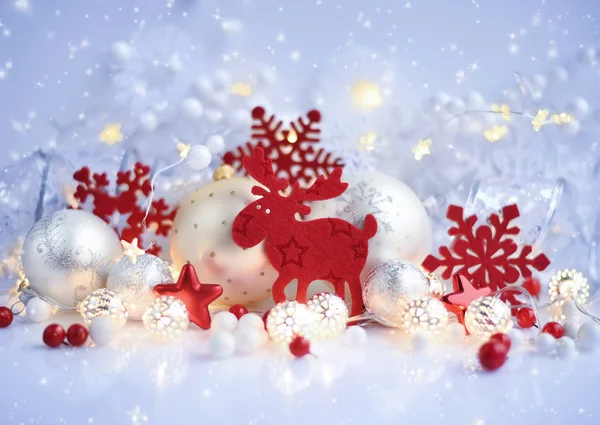 Christmas decorative elk with balls and Christmas lights.