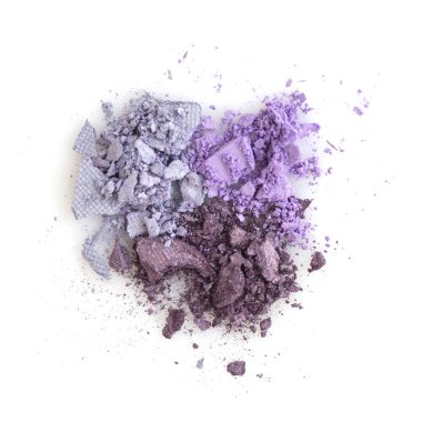 Beyaz arka plan üzerinde örnekleri karışık renkli göz farı ezilmiş. 