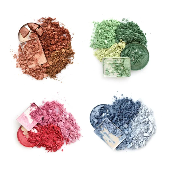 Crushed color eyeshadows on white background. Top view — Stock Photo, Image
