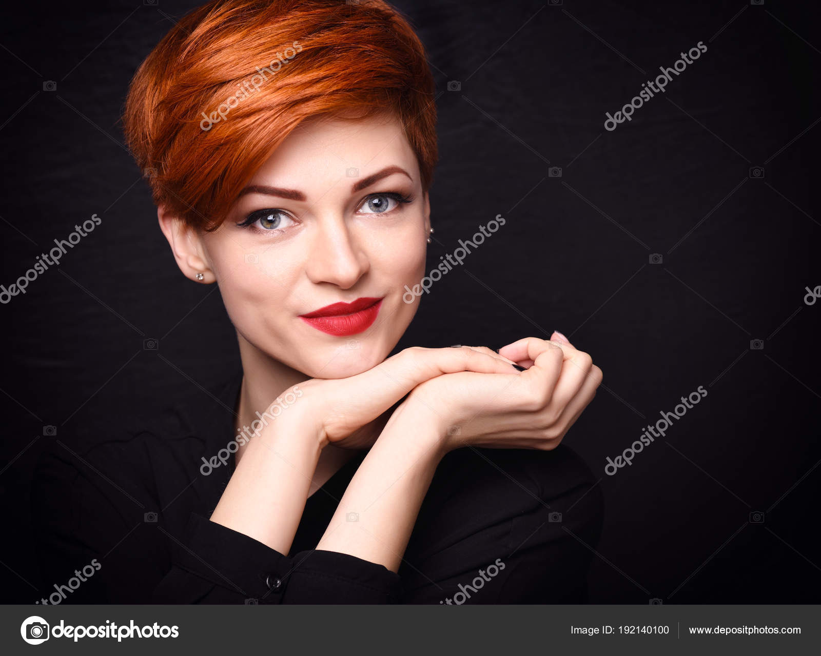 Portrait Of A Beautiful Young Red Haired Woman With Short Hair On