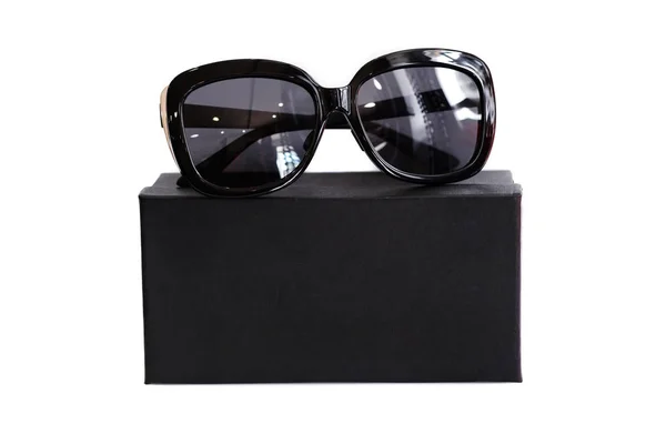 Fashionable sunglasses with box on white background — Stock Photo, Image