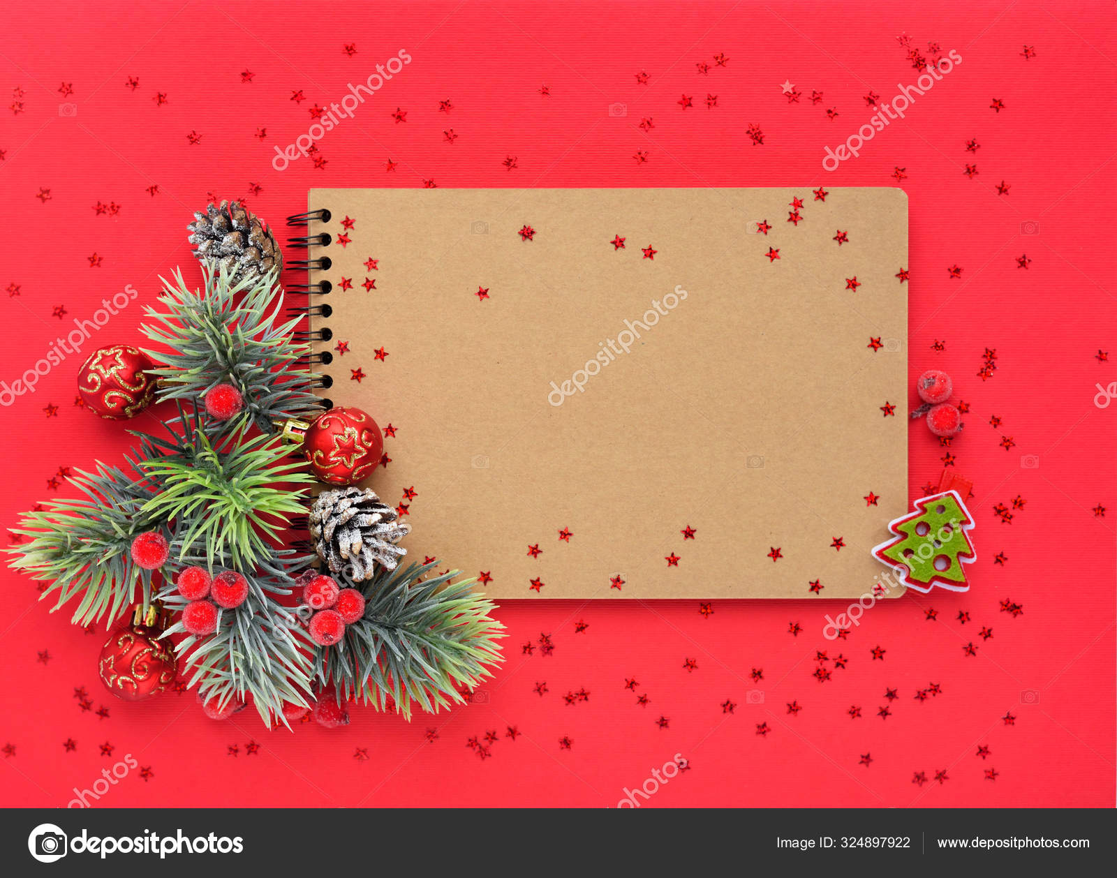 Christmas branches, cones, decorations on parchment paper. Holiday Christmas  background.Copy space for text or design Stock Photo