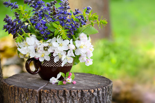 Bouquet of spring flowers on the natural background