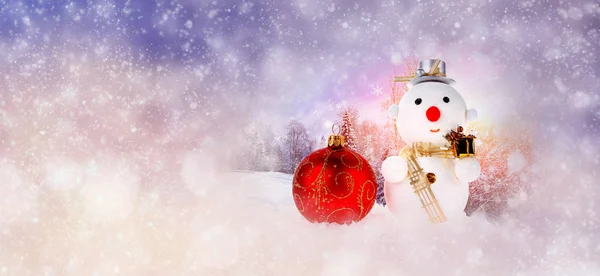 Winter background with christmas ball and snowman — Stock Photo, Image