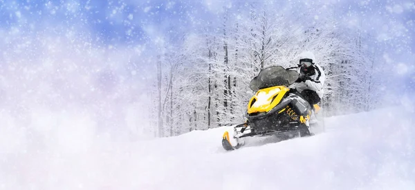 Winter background with man on snowmobile — Stock Photo, Image