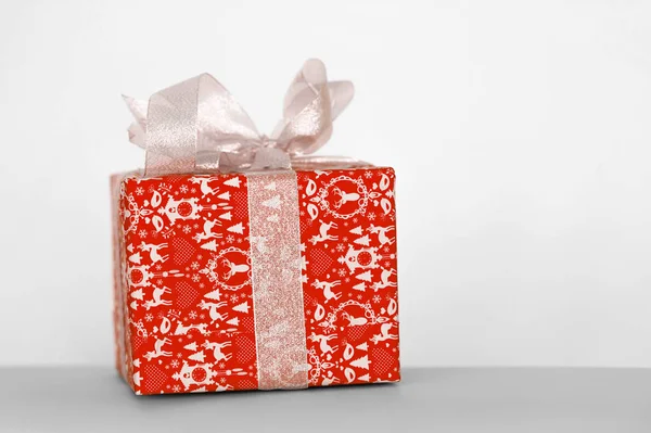 Gift box with ribbon on white background — Stock Photo, Image