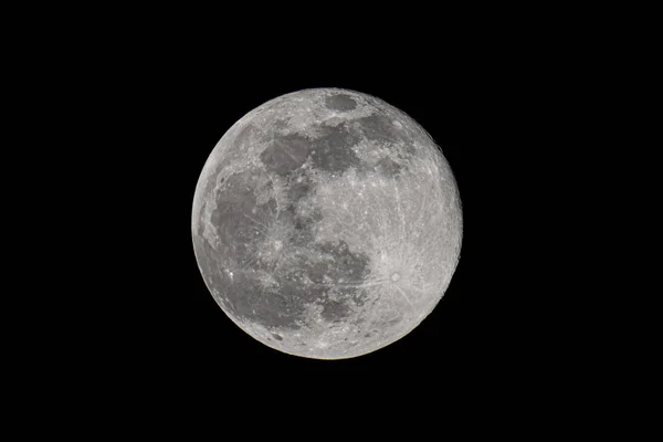 Lua da Terra brilhando em fundo preto — Fotografia de Stock