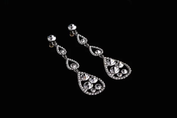 Silver earrings with diamonds — Stock Photo, Image