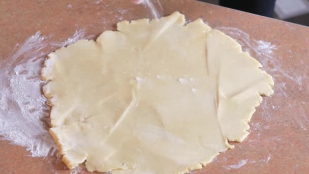 Baker kneading dough with rolling pin on table — Stock Video