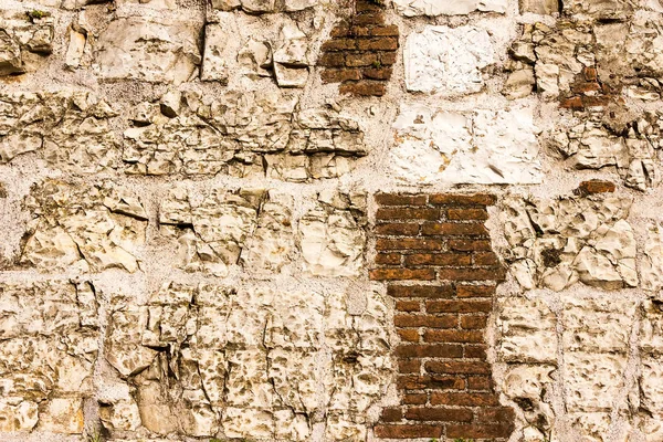 Parede de pedra com padrão real cor cinza de design de estilo moderno decorativo cimento superfície rachada desigual — Fotografia de Stock