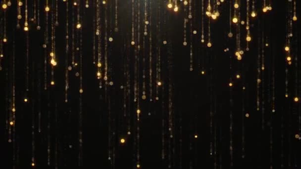 Caduta particelle d'oro tremolio e luccichio su uno sfondo nero. Sfondo astratto per glamour moda e benessere benessere lusso — Video Stock