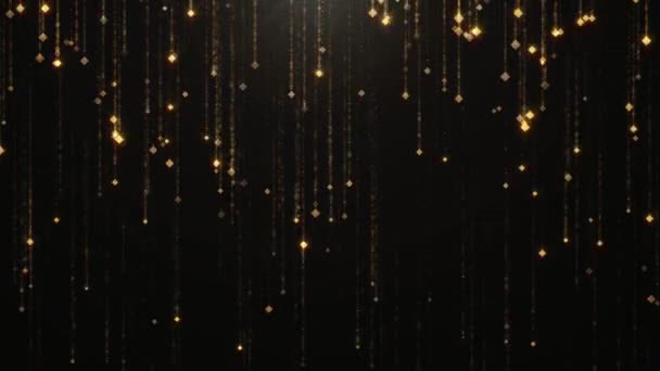 Falling gold particles flicker and shimmer against a black background. Abstract background for fashion glamor and wealth prosperity — Stock Video