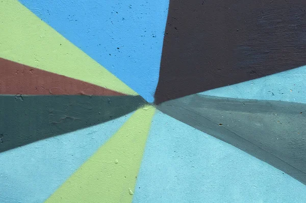 Fragment of graffiti with color geometric drawing on the wall