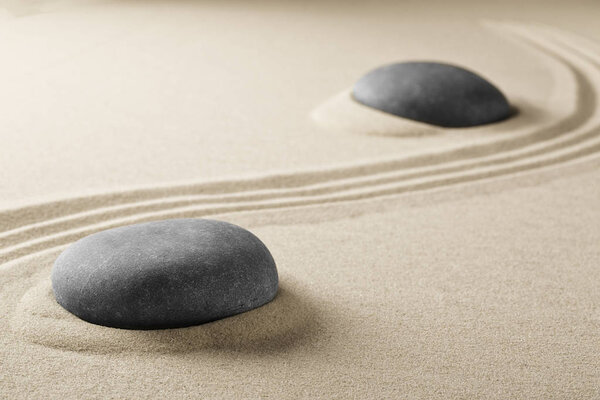 zen stone garden with meditation stone
