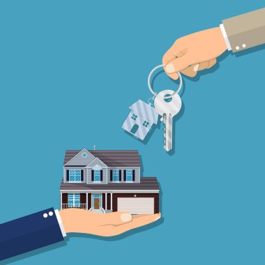 İşadamı veren anahtar evi için eller