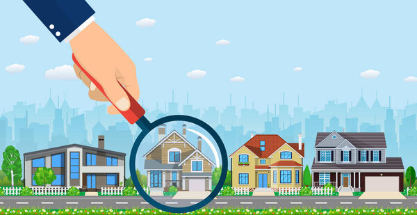 Magnifying glass with house.