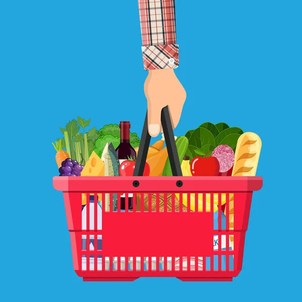 Cesta de la compra llena de productos de alimentación — Vector de stock