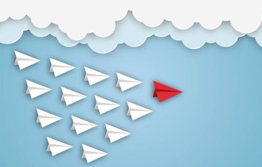 Paper airplanes flying from clouds on blue sky