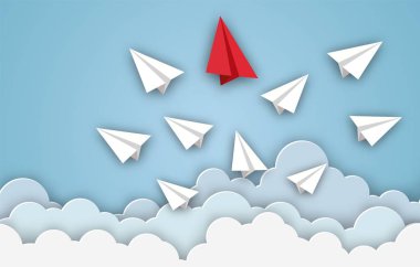 Paper airplanes flying from clouds on blue sky