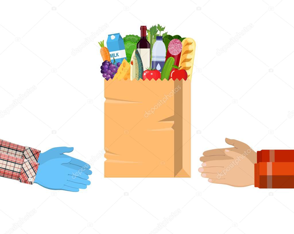 Hands hold food package.