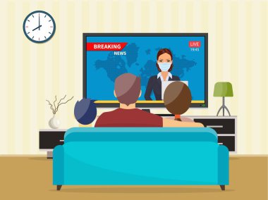 TV haberleri izleyen kedili bir aile.