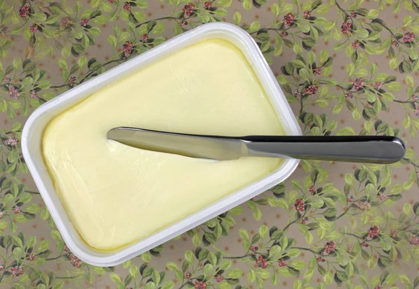 Margerine with knife Stock Picture