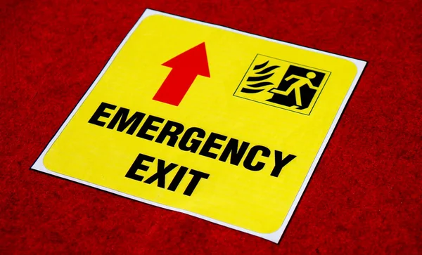 Closeup Sign Letters Emergency Exit Floor Public Place — Stock Photo, Image