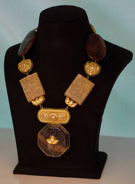 Closeup of Indian woman necklace in display of a shop