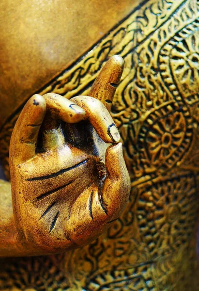 closeup of  hand of buddha in meditation pose