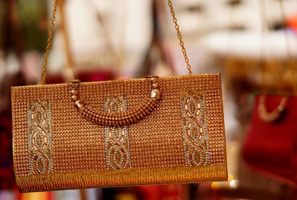Closeup of Indian woman handmade purse or  hand bag in display of shop
