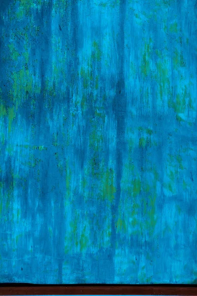 Mavi eski metal duvar