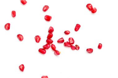 beyaz zemin üzerine nar