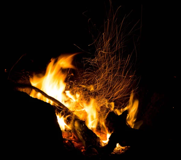 Fire with sparks on a black background Stock Image