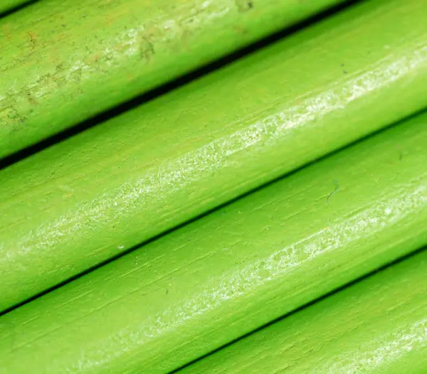 Gröna pennor som bakgrund — Stockfoto