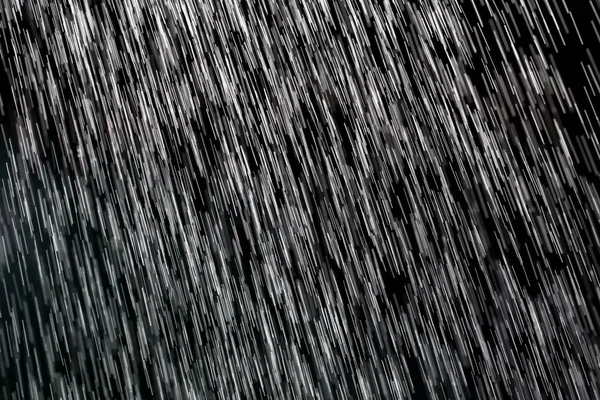 Βροχή σε μαύρο φόντο — Φωτογραφία Αρχείου