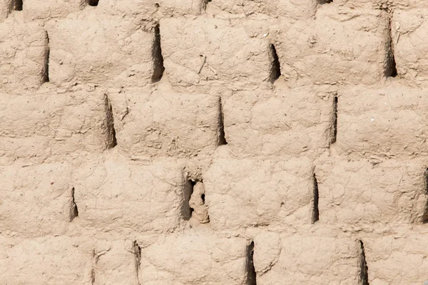 Cihlová zeď z hlíny — Stock fotografie