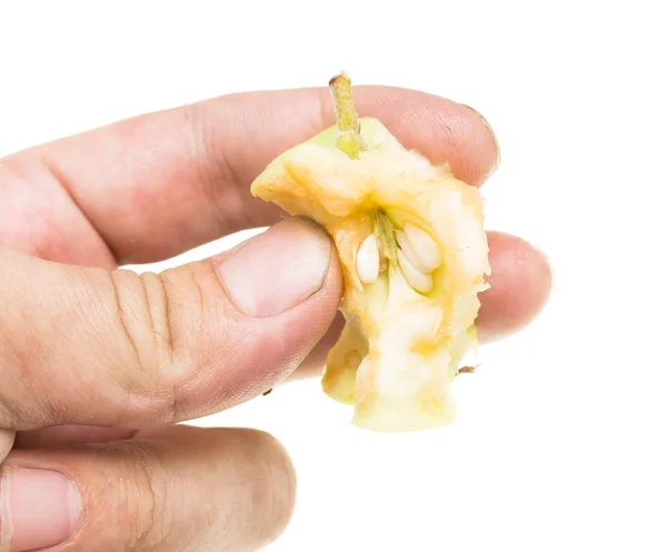 Gebissener Apfel in der Hand auf weißem Hintergrund — Stockfoto