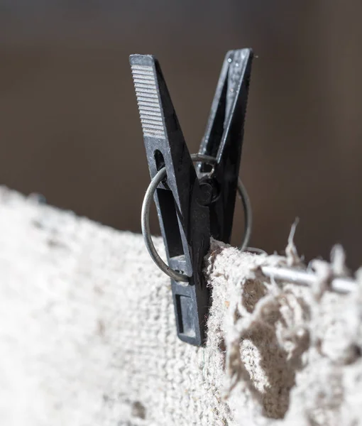 Clothespin on linen — Stock Photo, Image