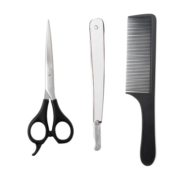 Comb with scissors and razor on a white background — Stock Photo, Image