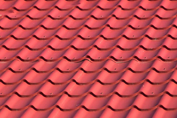 Red roof tiles on the roof as a background — Stock Photo, Image