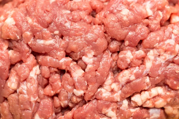 Carne picada como pano de fundo. macro — Fotografia de Stock