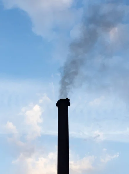 Smoke from a pipe against the sky — Stock Photo, Image