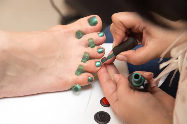 Pedekyur in de schoonheidssalon — Stockfoto