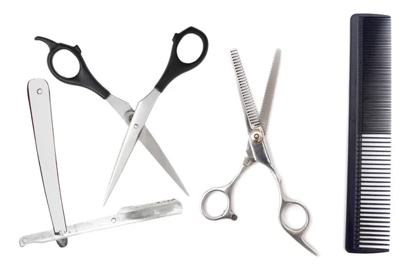 Comb with scissors and razor on a white background — Stock Photo, Image