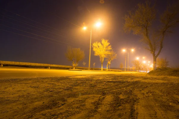 Road at night with moving cars — Stock Photo, Image