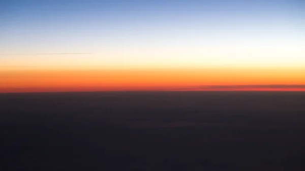 Zonsondergang van het vliegtuig — Stockfoto