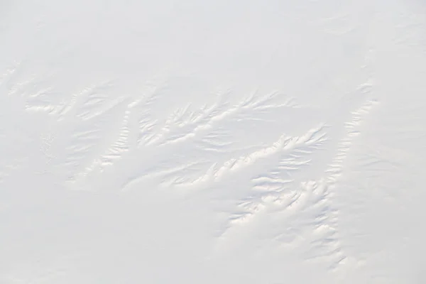 Terre enneigée. vue depuis l'avion — Photo