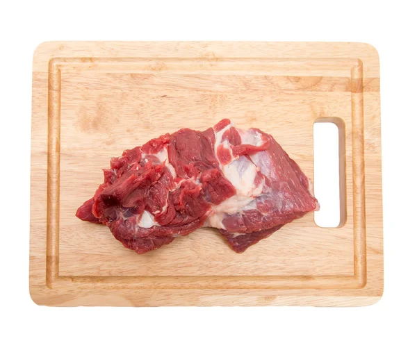 Meat on a board on a white background — Stock Photo, Image