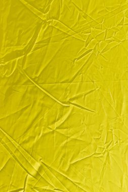 arka plan olarak buruşuk sarı bez