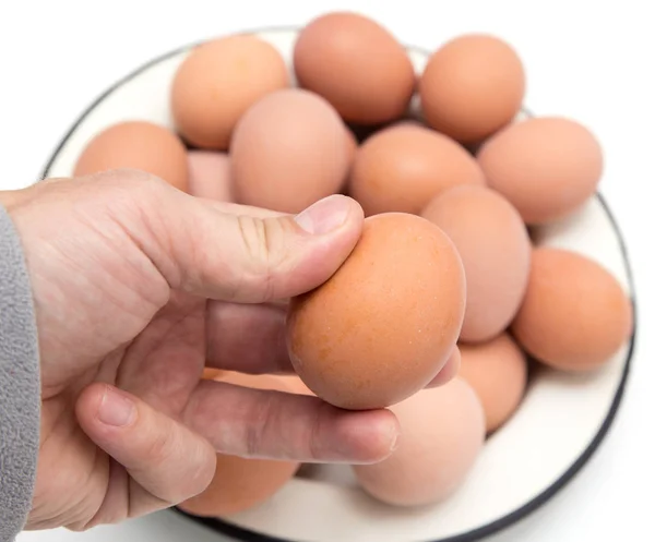 Boiled eggs in his hand — Stock Photo, Image